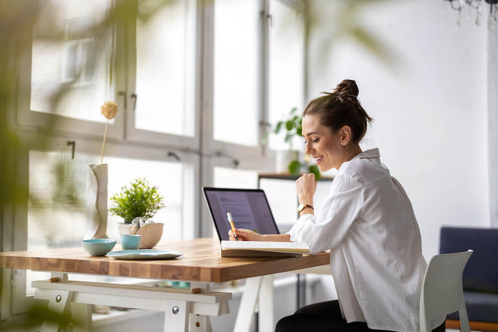 Woman reading about donor database to scale her organization