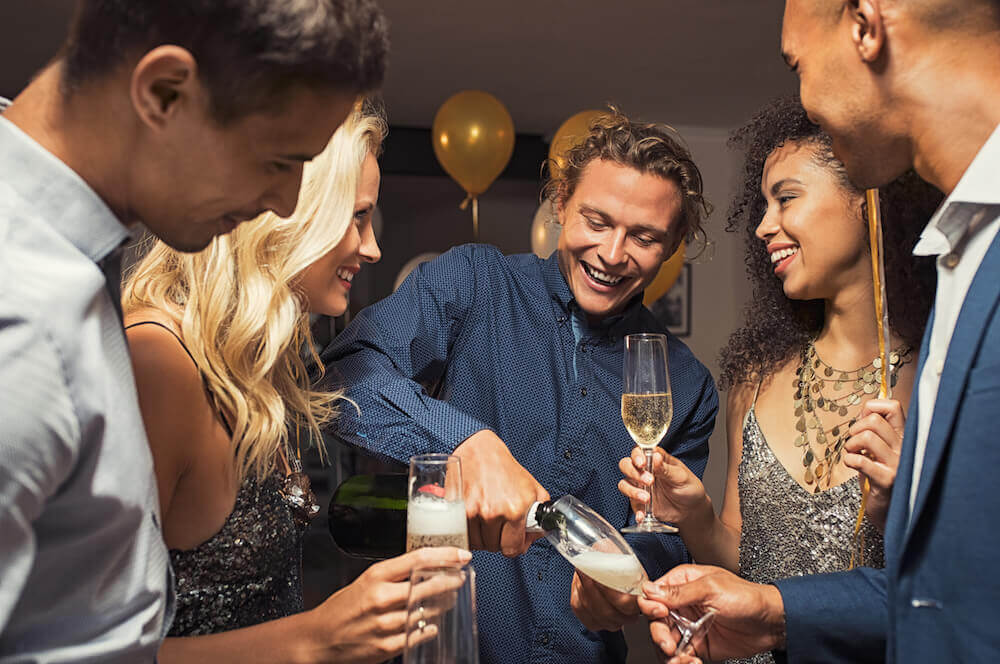 A group of people celebrating at a donor appreciation event