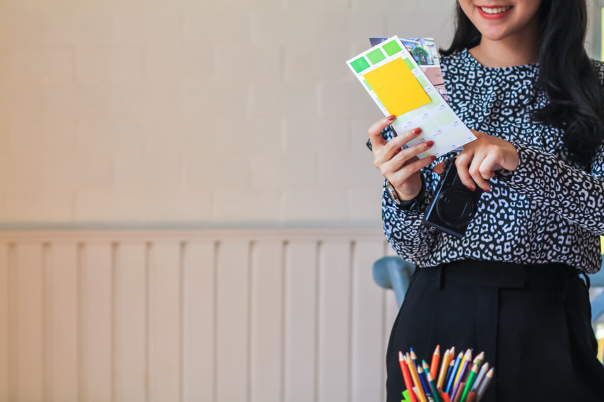 Woman looking at color swatches