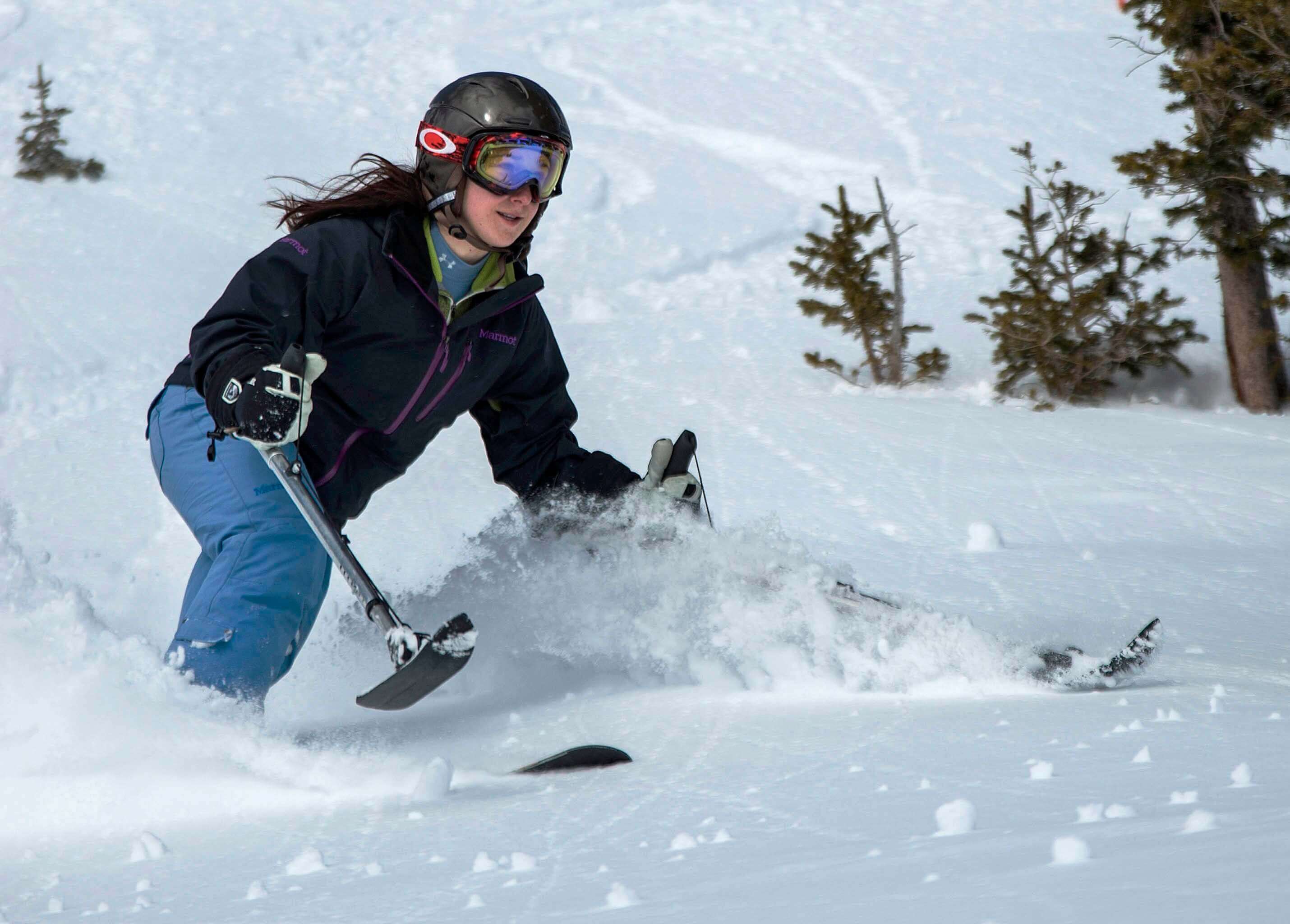 Girl skiing down a mountain