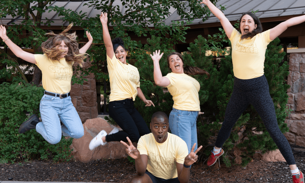 Givebutter's Marketing team jumping of excitement for upcoming giving Tuesday