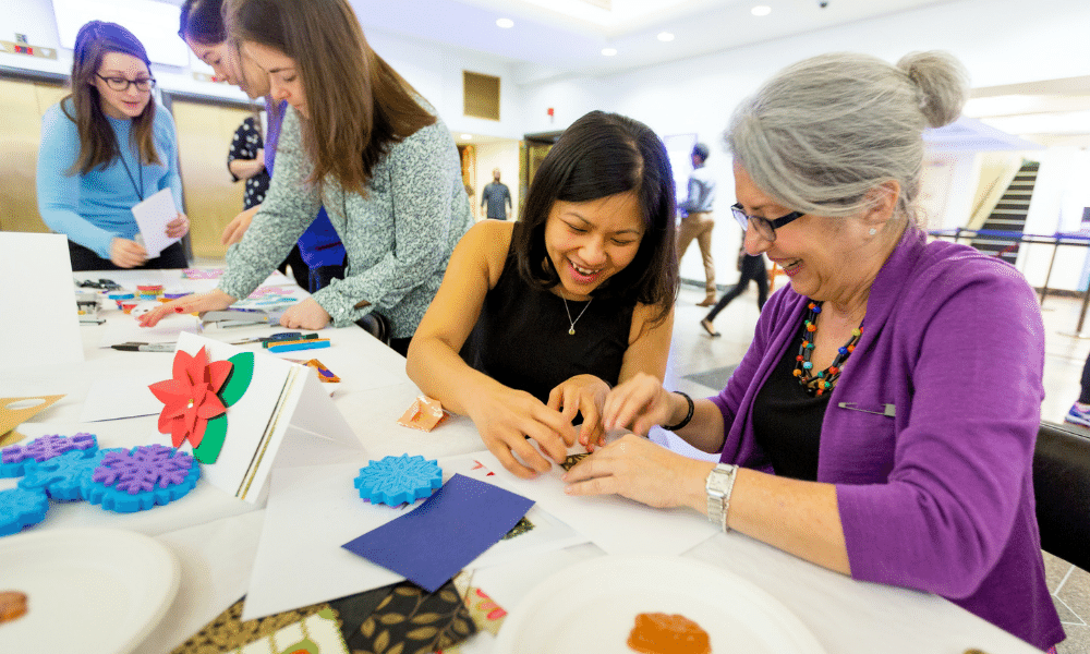 Group of females making decorations