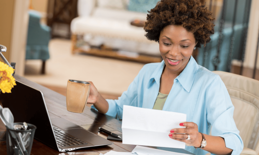 Woman reading an annual appeal letter from a nonprofit